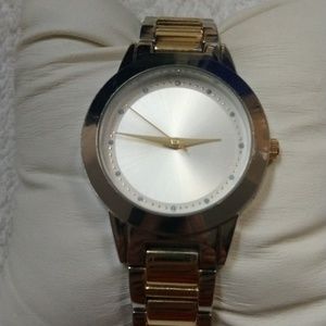 Unisex watch stainless steel with goldtone